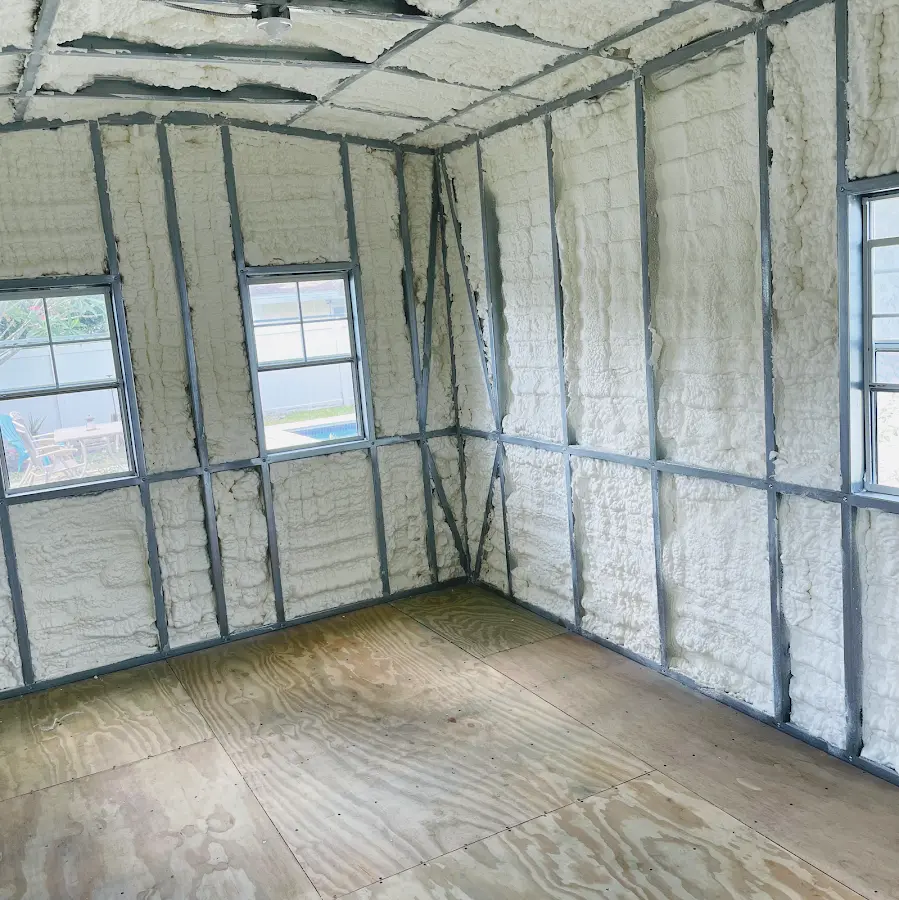 Closed-cell spray foam insulation applied to wall cavities in a residential project in Navarre